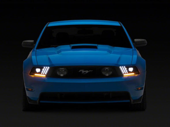 Raxiom 10-12 Ford Mustang LED Projector Headlights SEQL Turn Signals- Blk Housing (Clear Lens)