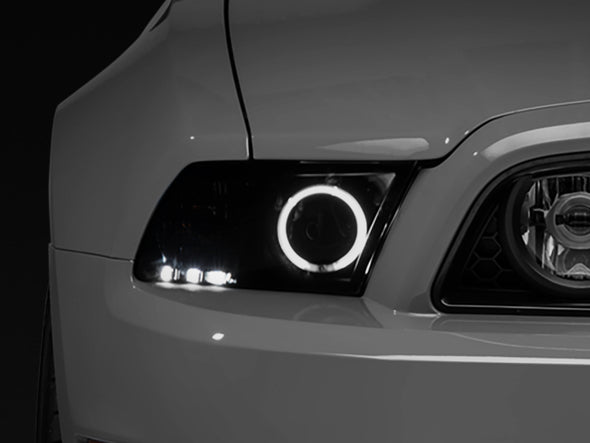 Raxiom 13-14 Ford Mustang w/ Factory HIDLED Halo Projector Headlights- Black Housing (Smoked Lens)